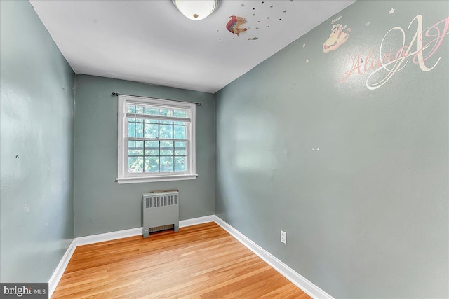 1240 Harding Dr, Havertown, PA 19083 - empty room featuring radiator and light wood-style floors