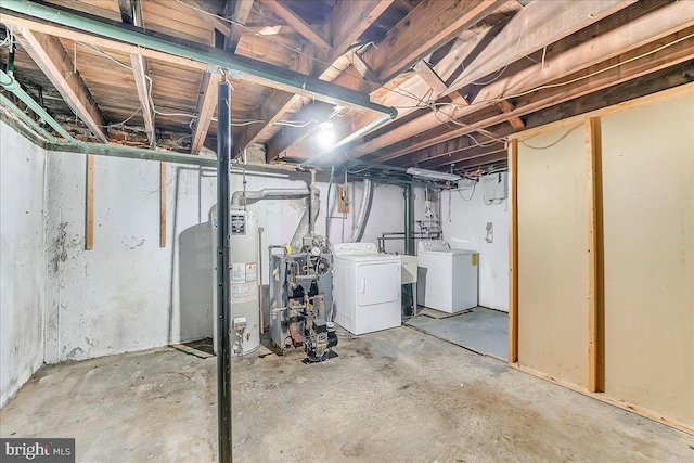 1240 Harding Dr, Havertown, PA 19083 - unfinished basement featuring washer and clothes dryer, gas water heater, and a heating unit