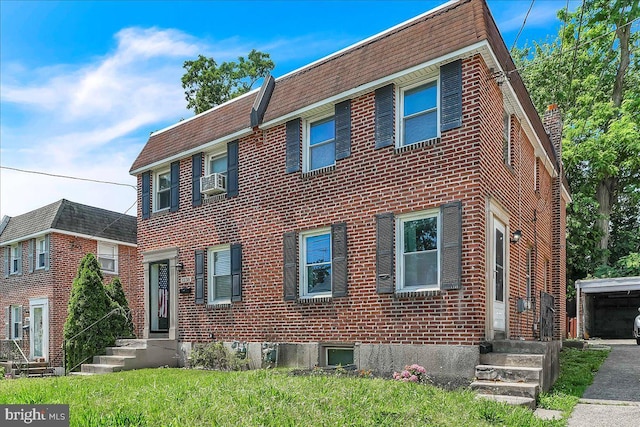 1240 Harding Dr, Havertown, PA 19083 - view of front facade featuring brick siding and cooling unit