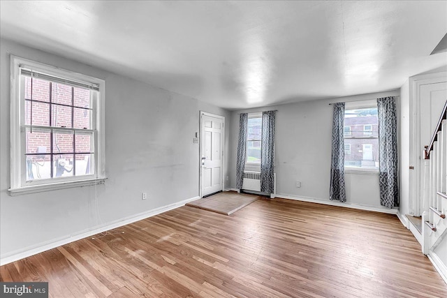 1240 Harding Dr, Havertown, PA 19083 - entrance foyer featuring light wood-style flooring and stairway
