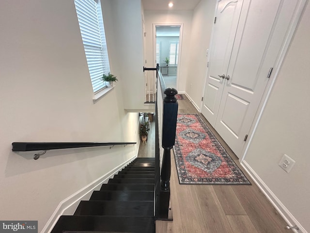 9402 James Macgowan Ln Unit 611, Owings Mills, MD 21117 - stairway with wood finished floors, baseboards, and recessed lighting