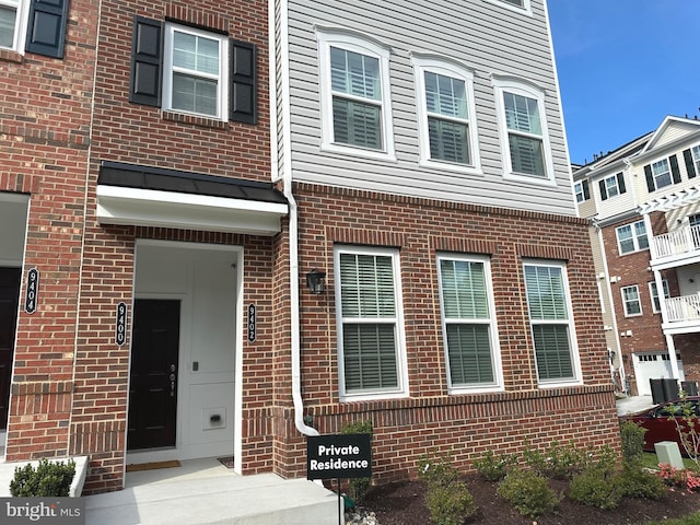 9402 James Macgowan Ln Unit 611, Owings Mills, MD 21117 - view of front of property with brick siding