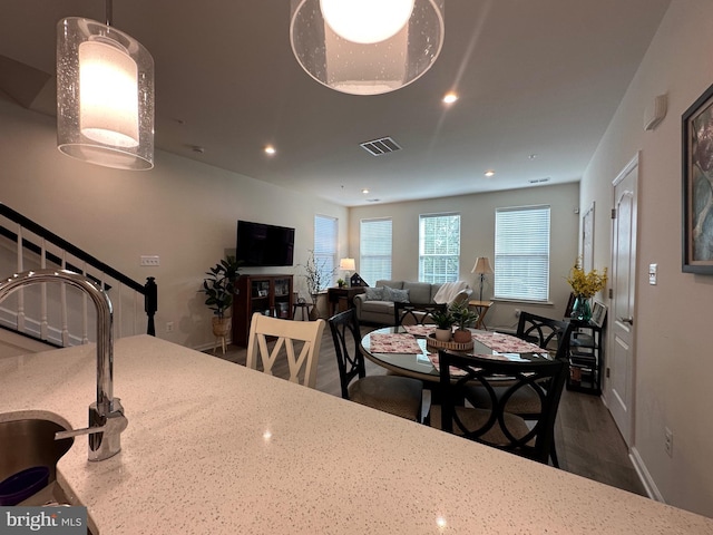9402 James Macgowan Ln Unit 611, Owings Mills, MD 21117 - dining area with wood finished floors, baseboards, stairway, and recessed lighting