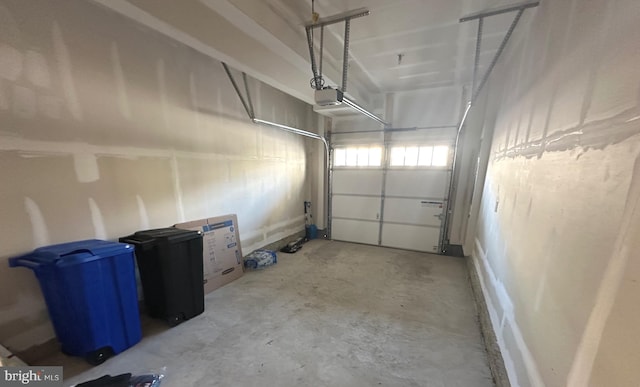 9402 James Macgowan Ln Unit 611, Owings Mills, MD 21117 - garage featuring a garage door opener