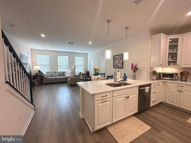 9402 James Macgowan Ln Unit 611, Owings Mills, MD 21117 - kitchen featuring a sink, dishwasher, a peninsula, white cabinetry, and dark wood-style flooring