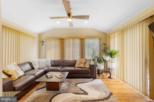 738 Prospect Rd, Monroe Township, NJ 08831 - living room with lofted ceiling, a ceiling fan, wood finished floors, and a textured ceiling