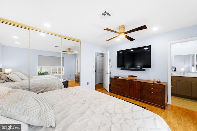 738 Prospect Rd, Monroe Township, NJ 08831 - bedroom featuring light wood-type flooring, a sink, connected bathroom, recessed lighting, and a closet