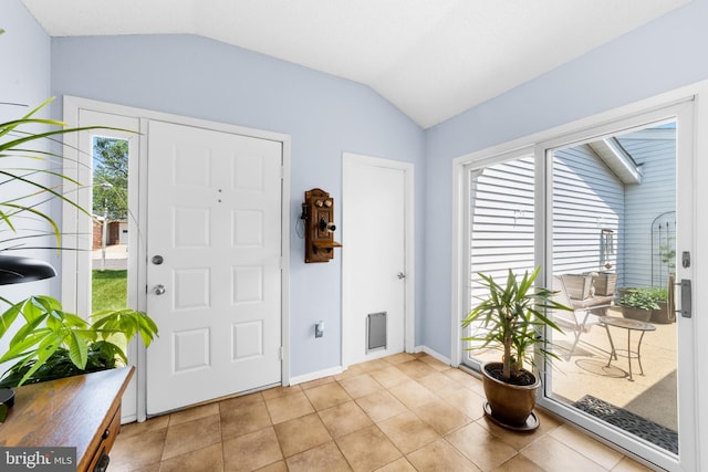 738 Prospect Rd, Monroe Township, NJ 08831 - foyer with vaulted ceiling, light tile patterned floors, and baseboards