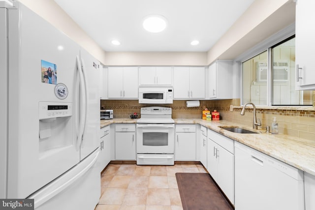 738 Prospect Rd, Monroe Township, NJ 08831 - kitchen with white appliances, a sink, backsplash, white cabinetry, and an AC wall unit