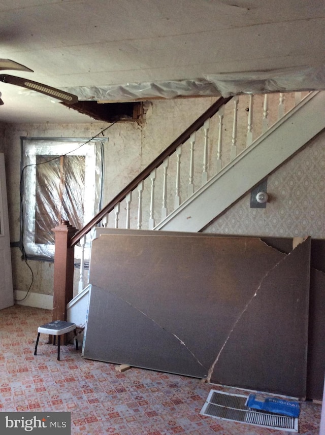 529 Oldtown Rd, Goldsboro, MD 21636 - stairs featuring a ceiling fan and wallpapered walls