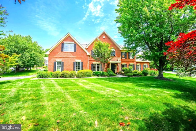 12704 Autumn Crest Dr, Herndon, VA 20171 - view of front of home with brick siding and a front yard