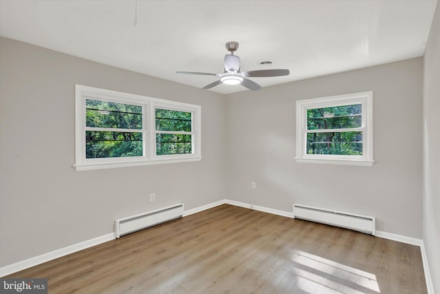 1216 Steamboat Rd, Shady Side, MD 20764 - unfurnished room with a baseboard heating unit, baseboard heating, plenty of natural light, and a ceiling fan