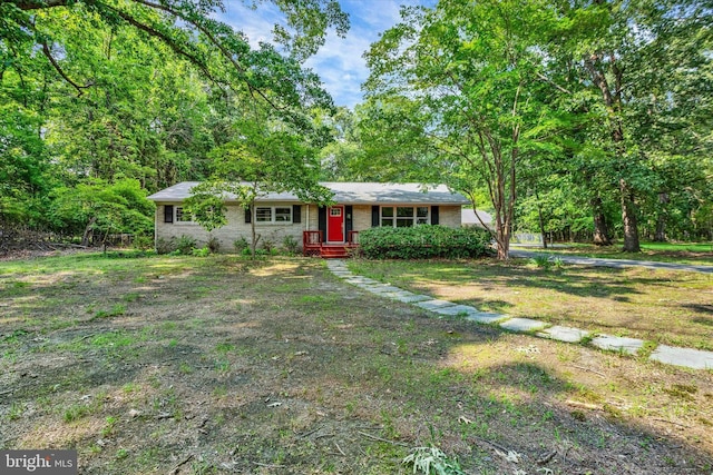 1216 Steamboat Rd, Shady Side, MD 20764 - view of front of property with brick siding and a front lawn