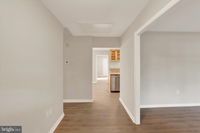 1216 Steamboat Rd, Shady Side, MD 20764 - corridor with wood finished floors and attic access