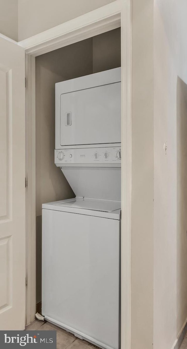 1451 Belmont St NW Unit 202, Washington, DC 20009 - laundry room with stacked washer and clothes dryer