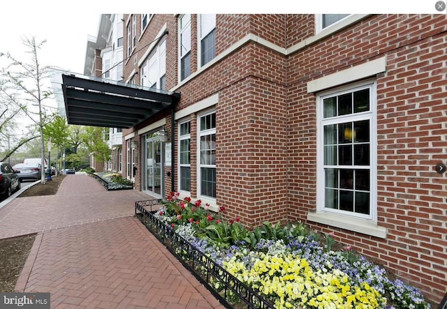 1451 Belmont St NW Unit 202, Washington, DC 20009 - view of home's exterior featuring brick siding