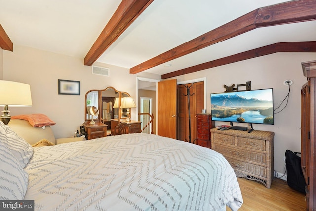 2360 Chip Pt, Warrington, PA 18976 - bedroom featuring light wood-style flooring, beam ceiling, and a closet