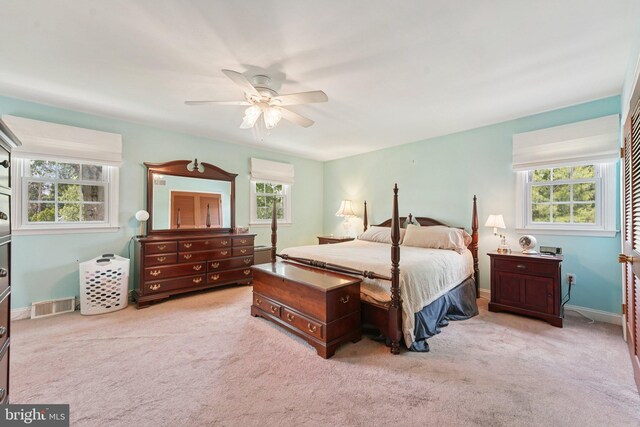 2360 Chip Pt, Warrington, PA 18976 - bedroom with multiple windows, light carpet, and a ceiling fan