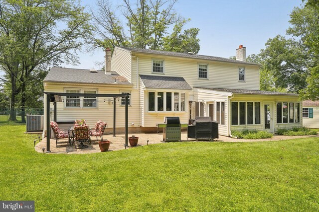 2360 Chip Pt, Warrington, PA 18976 - back of house with a chimney, a patio area, and a sunroom