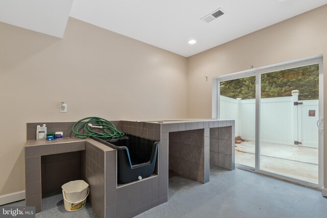 7027 Sand Cherry Way, Clinton, MD 20735 - bathroom featuring finished concrete floors and recessed lighting