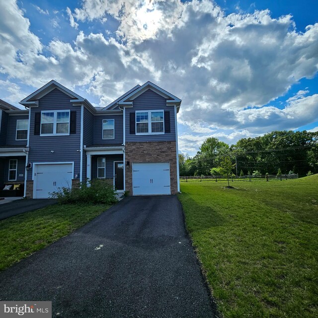 38 Peregrine Way, Burlington, NJ 08016 - townhome / multi-family property with driveway, a garage, and stone siding