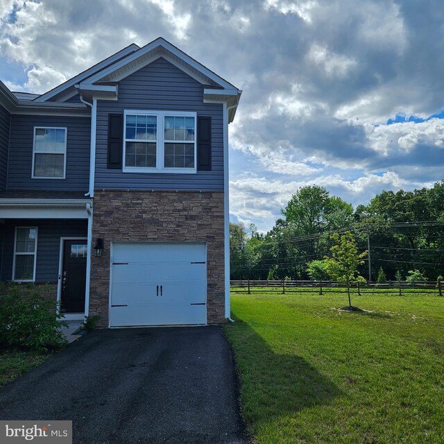 38 Peregrine Way, Burlington, NJ 08016 - view of side of property with stone siding, an attached garage, and asphalt driveway