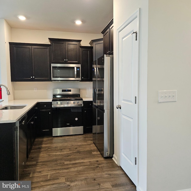 38 Peregrine Way, Burlington, NJ 08016 - kitchen with appliances with stainless steel finishes, a sink, dark wood-style flooring, light countertops, and recessed lighting