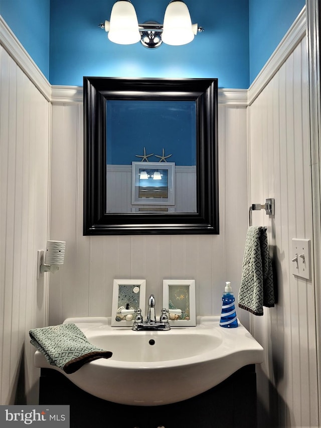 63 Briarwood Dr, Little Egg Harbor Twp, NJ 08087 - bathroom with a decorative wall, vanity, and wainscoting