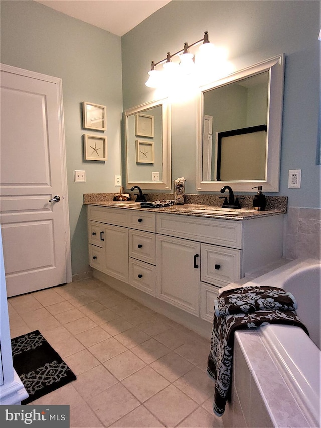 63 Briarwood Dr, Little Egg Harbor Twp, NJ 08087 - bathroom with tile patterned flooring, double vanity, and a tub to relax in