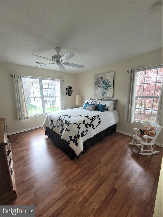 63 Briarwood Dr, Little Egg Harbor Twp, NJ 08087 - bedroom with multiple windows, wood finished floors, and baseboards