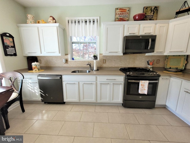 63 Briarwood Dr, Little Egg Harbor Twp, NJ 08087 - kitchen featuring black microwave, gas range, dishwashing machine, a sink, and tasteful backsplash