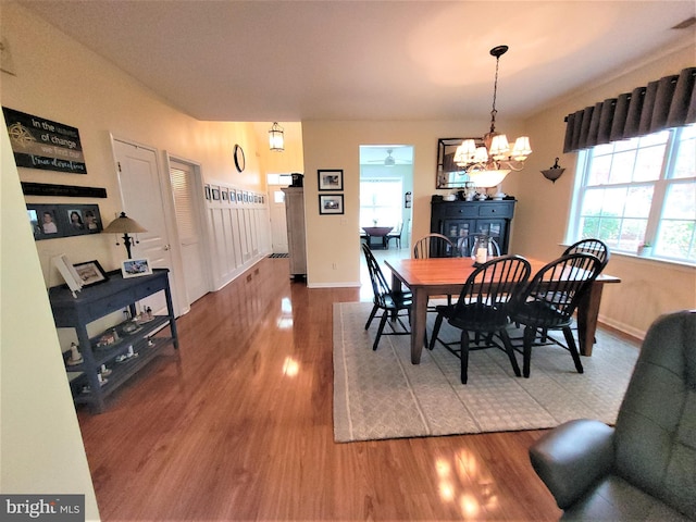 63 Briarwood Dr, Little Egg Harbor Twp, NJ 08087 - dining space featuring wood finished floors, a chandelier, baseboards, and a ceiling fan