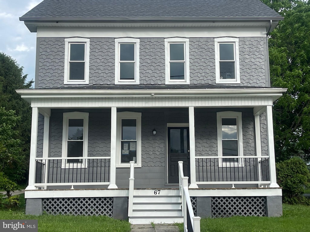 67 Main St, York, PA 17406 - view of front of home featuring covered porch and roof with shingles