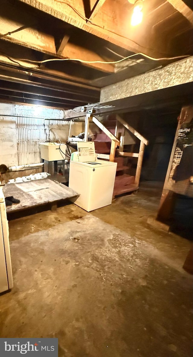 3141 S Atlanta Rd, Camden, NJ 08104 - unfinished basement featuring washer / dryer and a sink