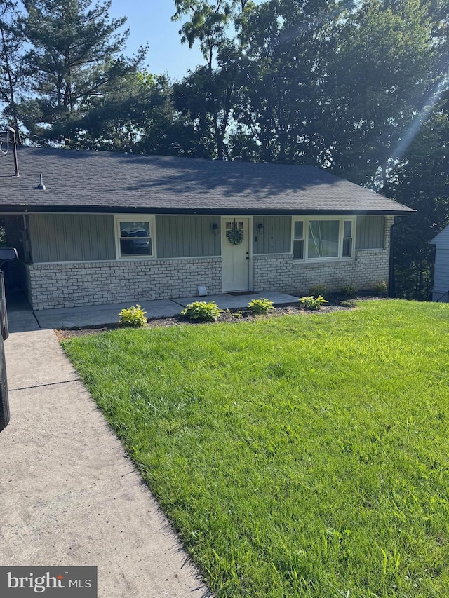 11815 Bayberry Ave, Cumberland, MD 21502 - single story home with brick siding, a front lawn, a shingled roof, and board and batten siding