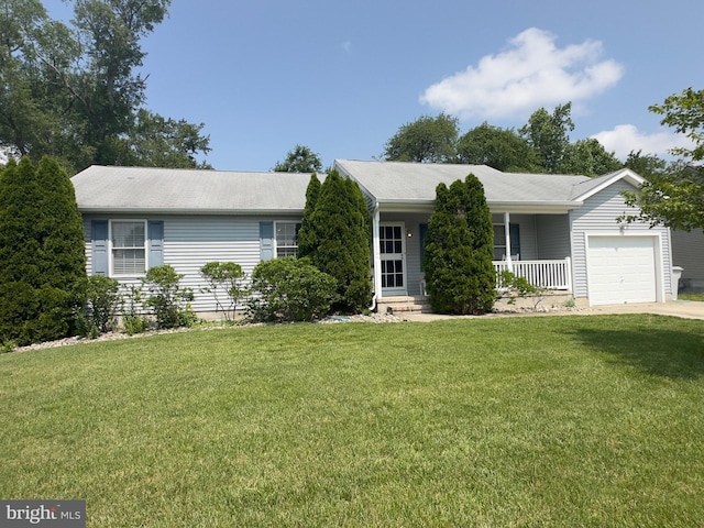 1140 Liberty Ave, Vineland, NJ 08360 - ranch-style home featuring a garage, a front yard, a porch, and concrete driveway