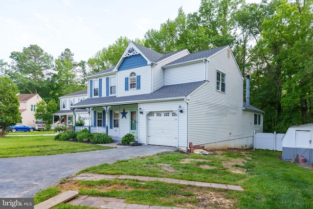 37 W Kapok, Newark, DE 19702 - view of front of home with a porch, driveway, a shingled roof, and a garage