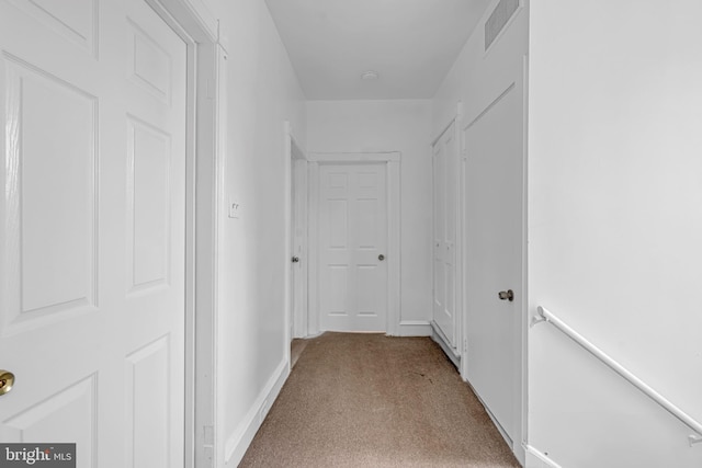 224 E Washington St, Riverside, NJ 08075 - corridor featuring light carpet and baseboards