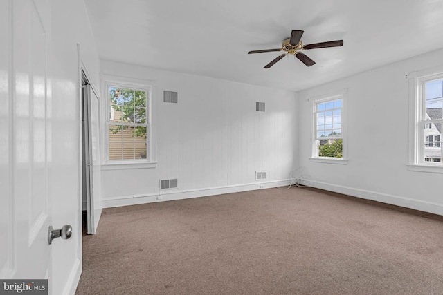 224 E Washington St, Riverside, NJ 08075 - spare room featuring carpet flooring, plenty of natural light, and a ceiling fan