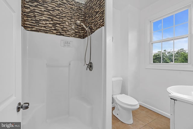 224 E Washington St, Riverside, NJ 08075 - bathroom featuring a shower, vanity, and tile patterned flooring