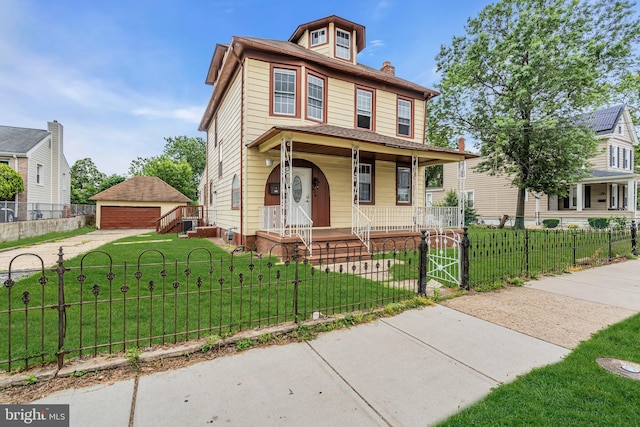 224 E Washington St, Riverside, NJ 08075 - traditional style home with a porch, a garage, a fenced front yard, a gate, and an outbuilding