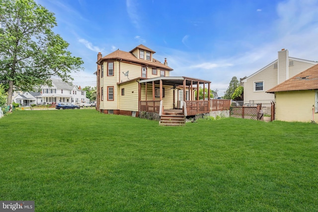 224 E Washington St, Riverside, NJ 08075 - rear view of house featuring a wooden deck and a chimney