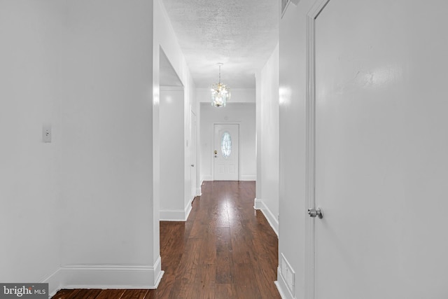 224 E Washington St, Riverside, NJ 08075 - corridor featuring a chandelier, hardwood / wood-style floors, and a textured ceiling