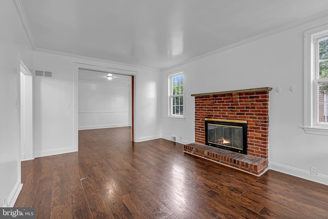 224 E Washington St, Riverside, NJ 08075 - unfurnished living room with crown molding, hardwood / wood-style floors, plenty of natural light, and a fireplace