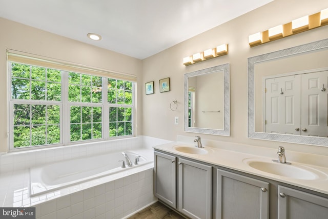 17542 Falls Pl, Round Hill, VA 20141 - bathroom featuring a bath and double vanity