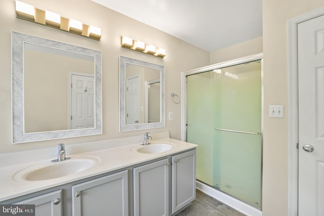 17542 Falls Pl, Round Hill, VA 20141 - full bath with double vanity, a stall shower, and wood finished floors