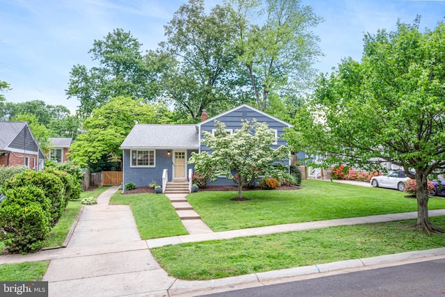 3603 Astoria Rd, Kensington, MD 20895 - view of front of house featuring driveway, a chimney, and roof with shingles