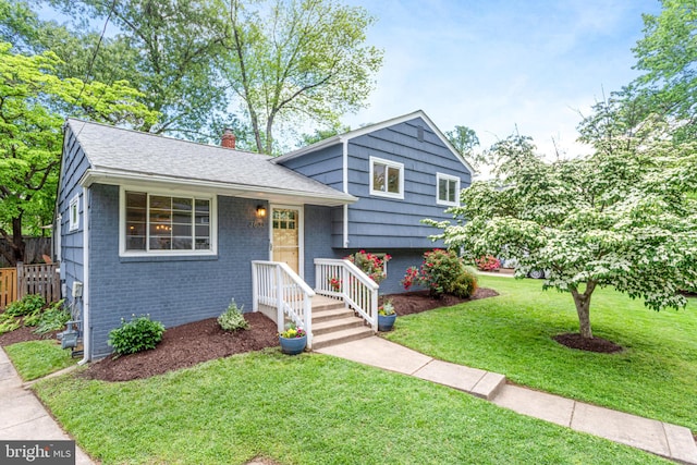 3603 Astoria Rd, Kensington, MD 20895 - tri-level home featuring brick siding, a chimney, and a shingled roof
