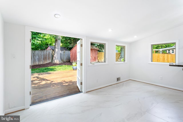 3603 Astoria Rd, Kensington, MD 20895 - doorway featuring vaulted ceiling, recessed lighting, and marble finish floors