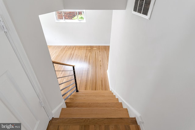 3603 Astoria Rd, Kensington, MD 20895 - stairs with baseboards and wood finished floors